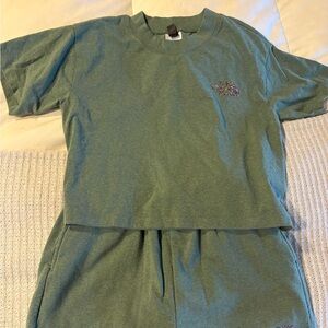 REI Women's Heathered Green Short Sleeve Tee and shorts